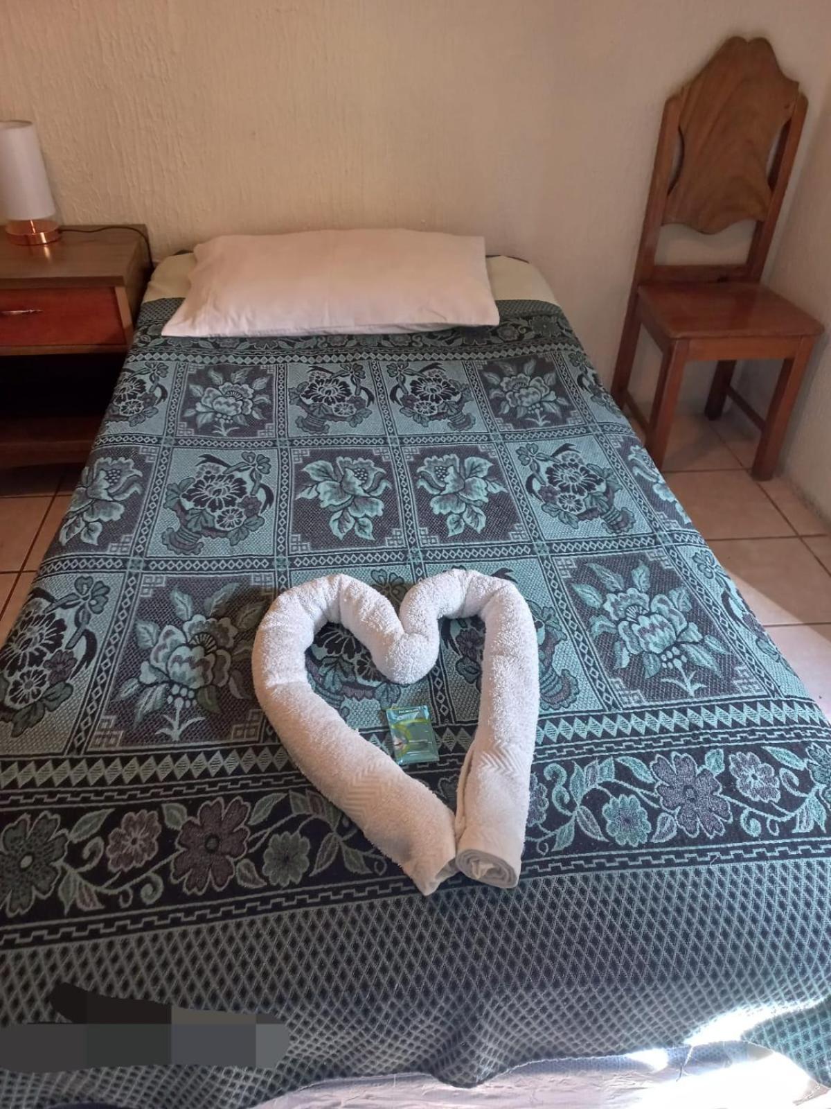 Huellas Hostal Antigua Rum bild